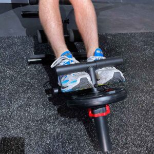 Mans feet using Tibialis Bar and weight plate